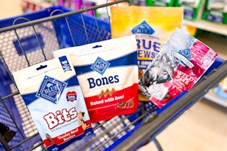 4 types of blue buffalo dog treats in a cart