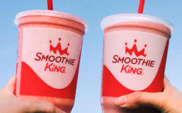 two people holding smoothie king cups. taken from their instagram
