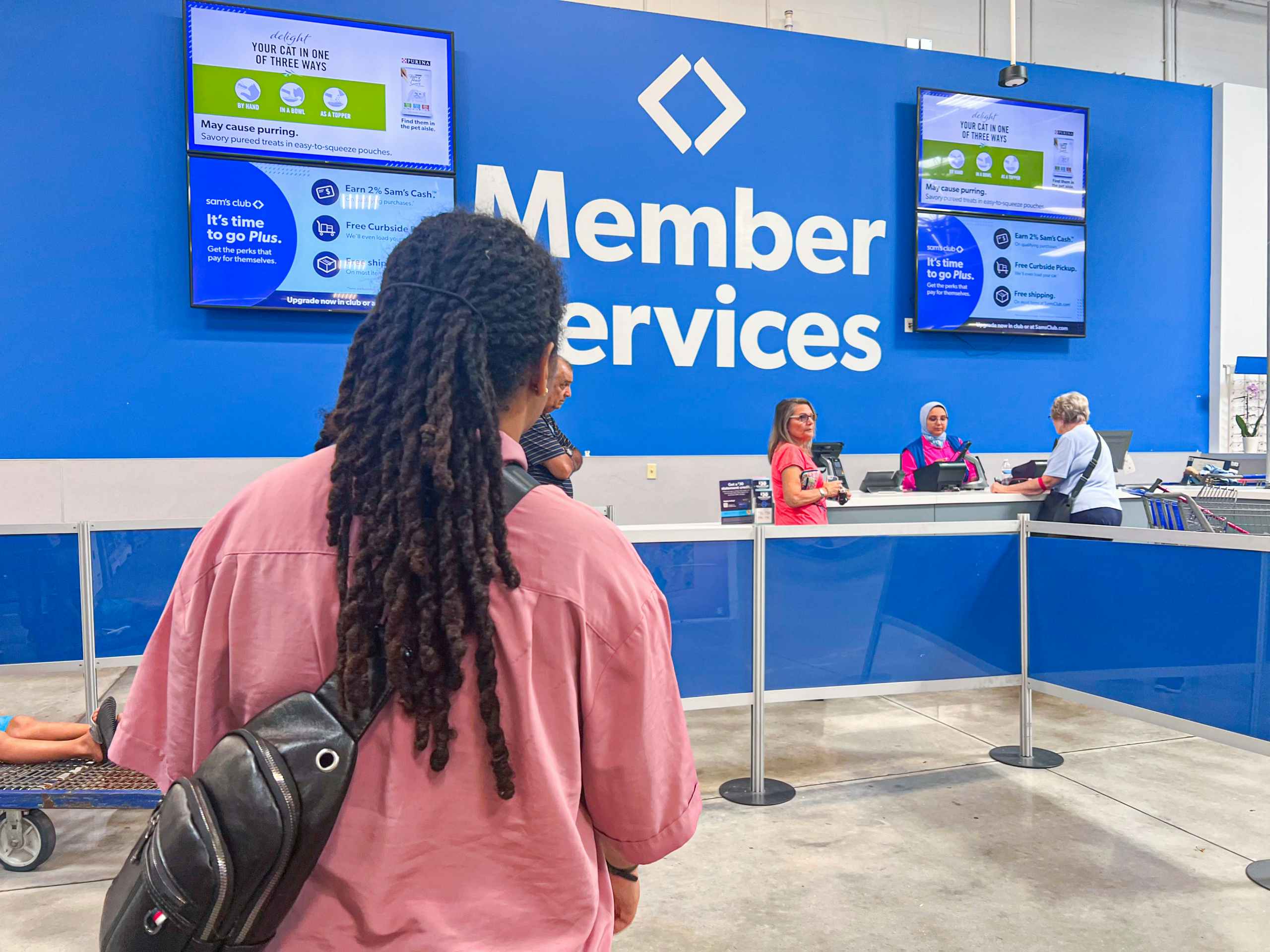 Person standing waiting at Member Services at Sam's Club