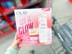 hand holding olay gift set