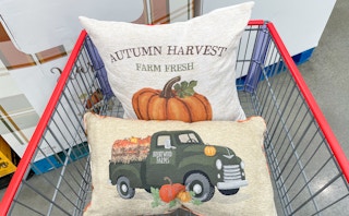 fall harvest pillows in a cart at costco