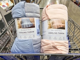 2 cooling throw blankets in a cart