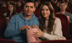people at the movies eating popcorn