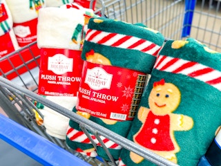 three holiday time christmas throws in walmart cart