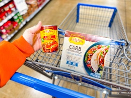 In-store photo taken at Walmart of 2 Old El Paso products in shopping cart