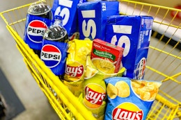 soda, chips, and soup in a cart