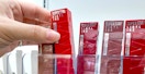 Maybelline Superstay Lipstick being grabbed from aisle shelf/display