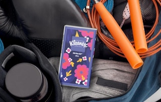 a pack of tissues with flowers on it in a gym bag