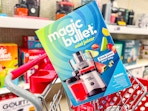 magic bullet mini juicer sitting on top a target cart