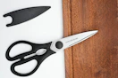 Heavy Duty Kitchen Scissors on wooden cutting board