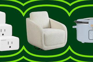 white wall plugs, white accent chair, and light blue slow cooker