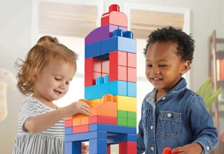 two kids playing with blocks