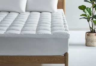 white Sertapedic pillow top mattress topper