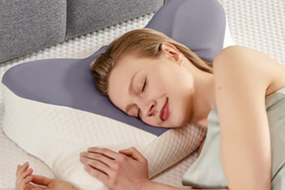 This Cervical Neck Pillow Is Just $12.99 on Amazon for a Limited Time