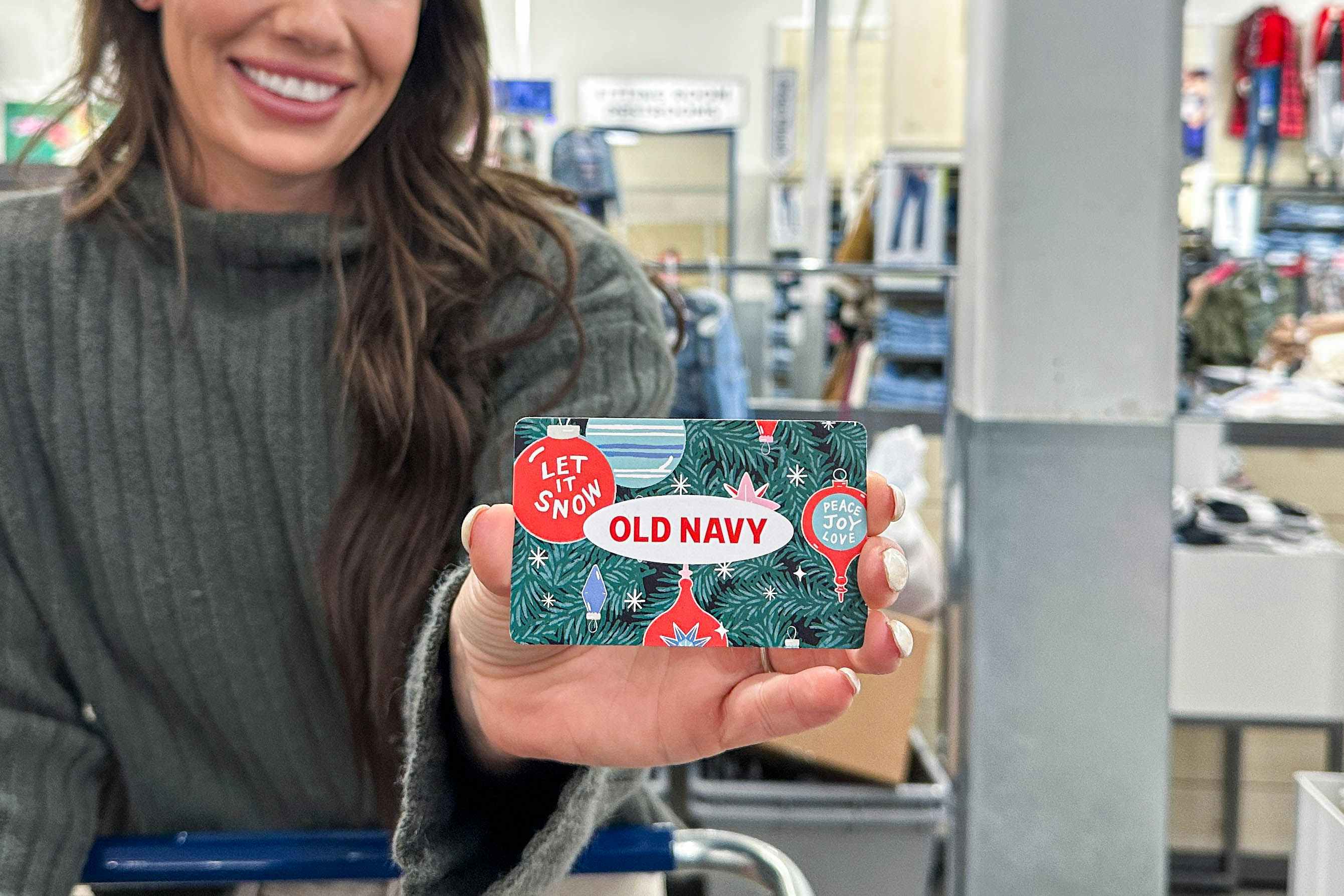 old navy gift card being held 