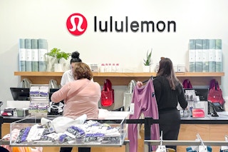 people checking out at lululemon outlet store