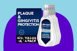  Crest Pro-Health Clinical Mouthwash with CPC on a purple background.