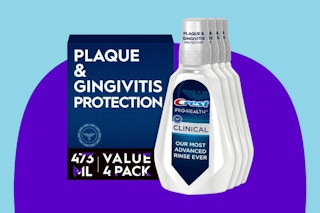  Crest Pro-Health Clinical Mouthwash with CPC on a purple background.