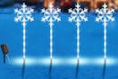 solar snowflake lights outdoors