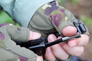 a man using a multitool set