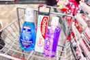 crest mouthwash, colgate toothpaste, maybelline eyeshadow, and safeguard hand soap in a cart
