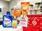 goldfish purex dickinsons flourish fancy feast wonder on counter next to target cart