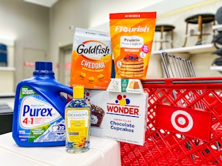 goldfish purex dickinsons flourish fancy feast wonder on counter next to target cart