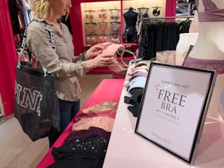 Person looking at bras at Victoria's Secret