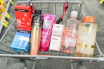 neutrogena, tresemme, loreal, eucerin, garnier, and tree hut products in a cart