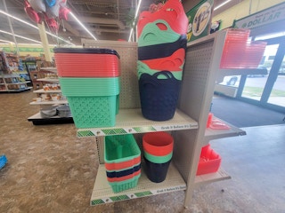display of colorful new storage bins in teal, navy, and coral