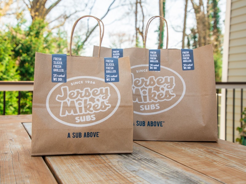 Jersey Mike's delivery bags on a table