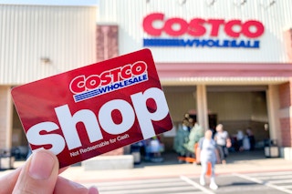 Costco Shop card held in front of Costco.