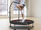 a person jumping on a mini trampoline 