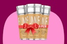 Three sticks of funnir hair wax tied with a red ribbon. Round beige bottles with silver tops. Fights frizz and errant strands to smooth.