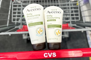 cvs shopping cart with 2 Aveeno skincare products