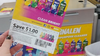 hand holding a Clean Bright save $1 coupon