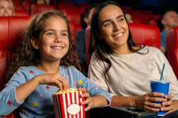 a woman and her daughter at a movie