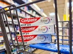 3 Colgate toothpastes in Walmart shopping cart