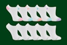 fruit of the loom socks on a green background