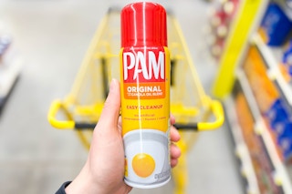 hand holding a bottle of pam cooking spray