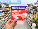 hand holding mr. clean magic erasers in walgreens