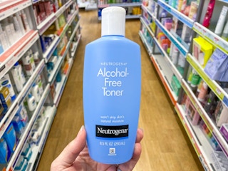 someone holding a neutrogena alcohol free toner