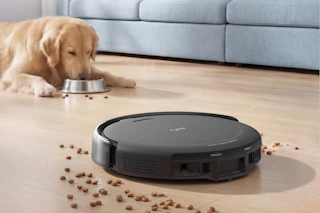 a eufy vacuum cleaning a floor