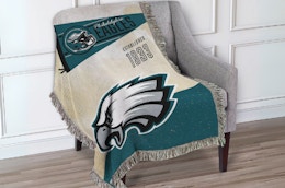 These NFL Woven Tapestries Are Just $19.99 at QVC card image