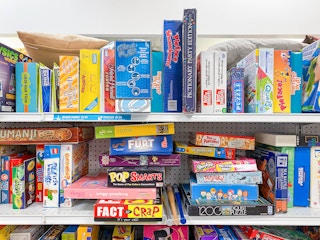 goodwill shelves with thrift store puzzles and games