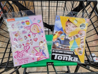 jojo siwa and tonka truck tattoos in a cart