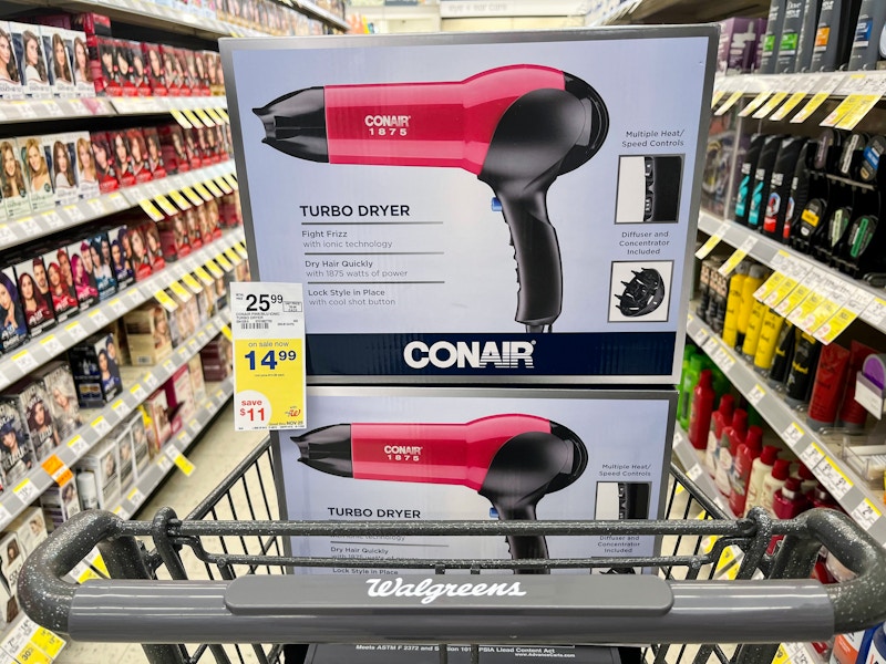 blow dryers with sale tag in a shopping cart