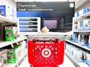 kenmore microwave oven sitting on top a target cart