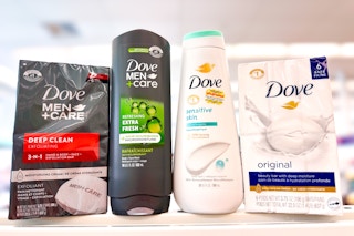 2 bottles of body wash and 2 packs of soap bars on store counter