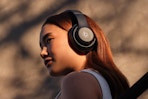 a woman wearing beats headphones